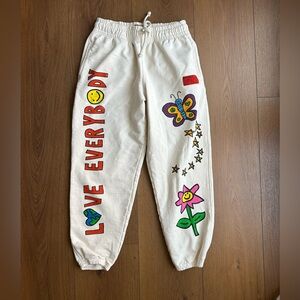 CHNGE Cream Sweatpants with Red Trim